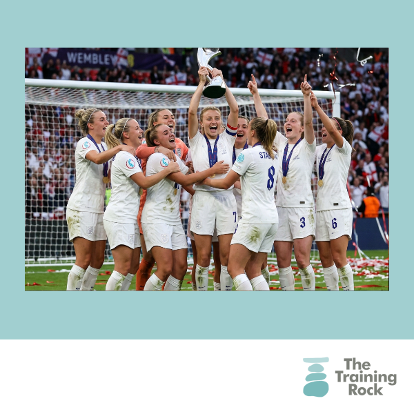 England women's football team celebrates winning at Wembley